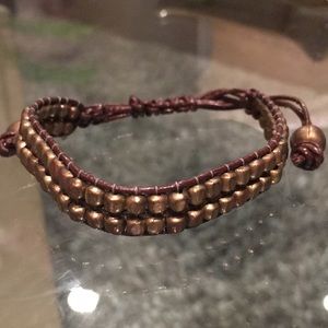 NWOT brown pleather and Gold beaded bracelet.